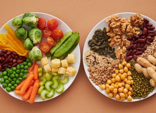 A vibrant flatlay of colorful vegetables and nuts showcasing a balanced diet concept.
